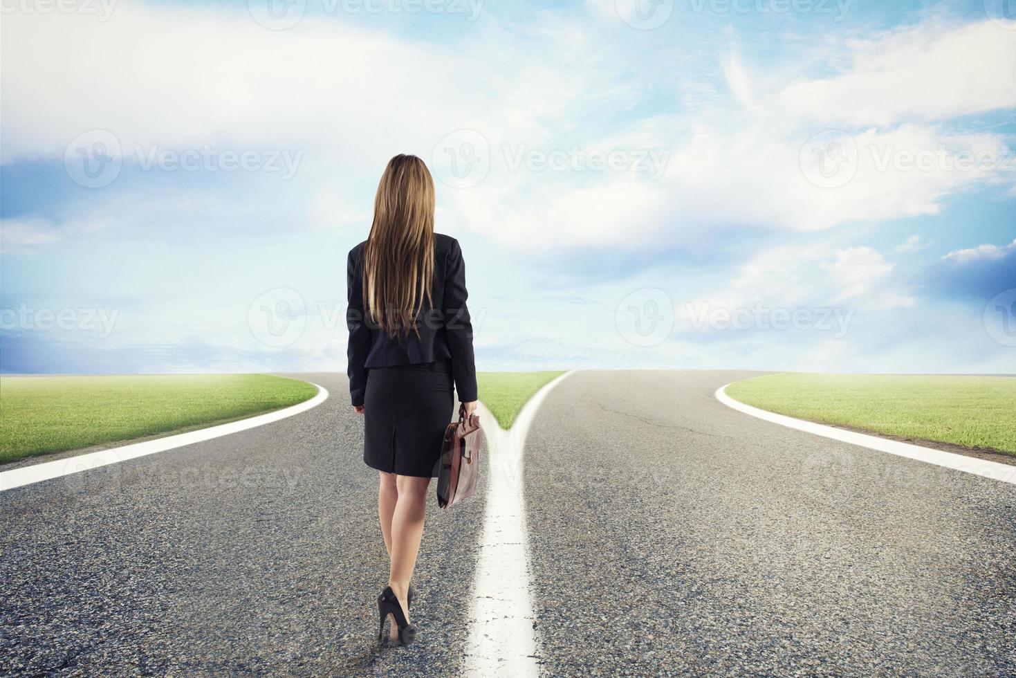 Choices of a businesswoman at a crossroads. Concept of decision photo