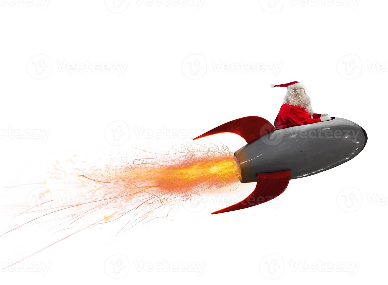 santa claus flies fast by a power rocket to deliver christmas gifts photo