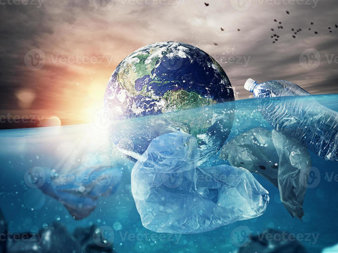 el tierra flotadores en el mar lleno de el plastico. salvar el mundo. mundo previsto por nasa foto