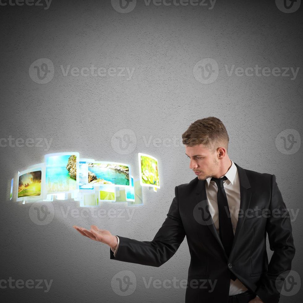 Businessman projects destinations photo