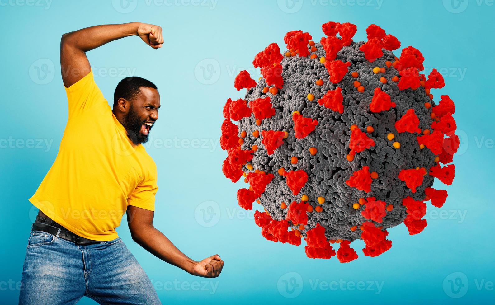 Man attacks with a punch the coronavirus. Blue background photo