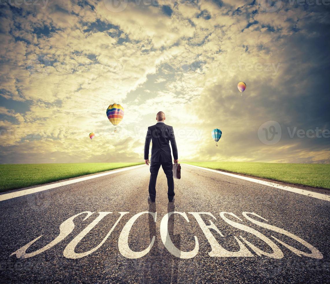 Man walks on a success way. Concept of successful businessman and company startup photo