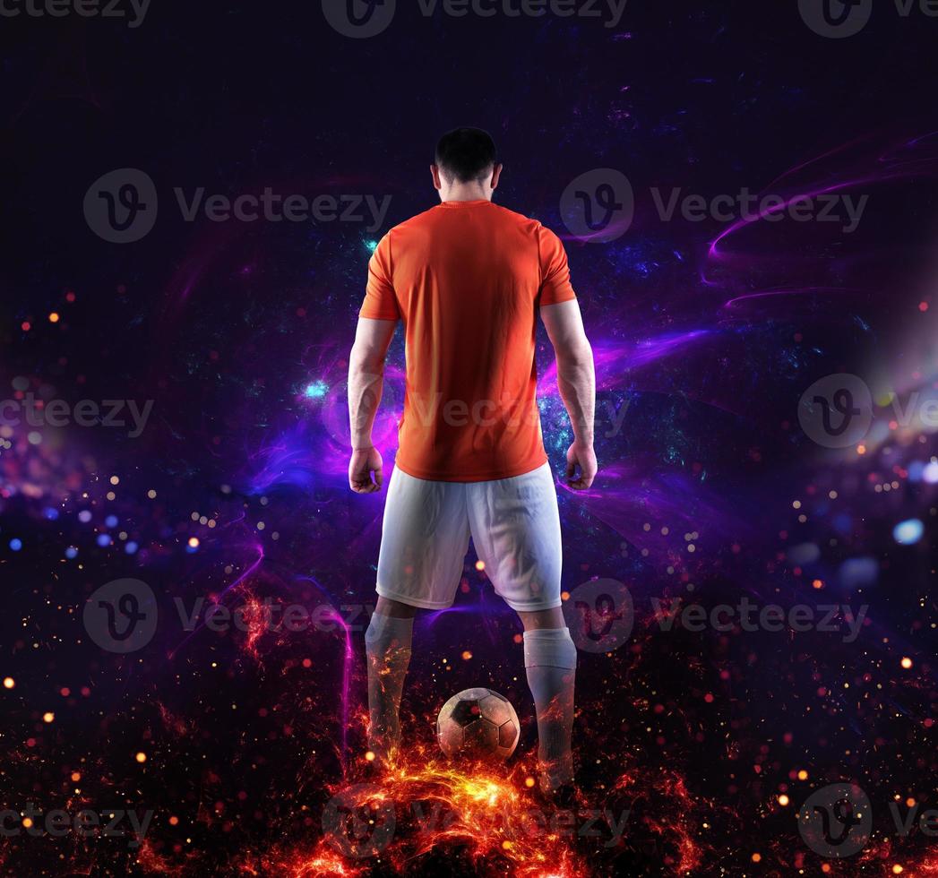 Football scene with soccer player in front of a futuristic digital background photo