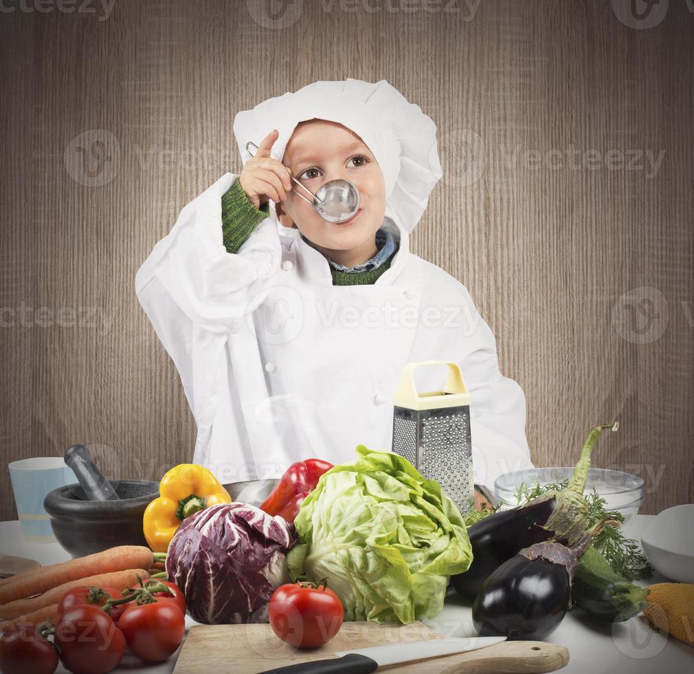 Baby cook tastes photo