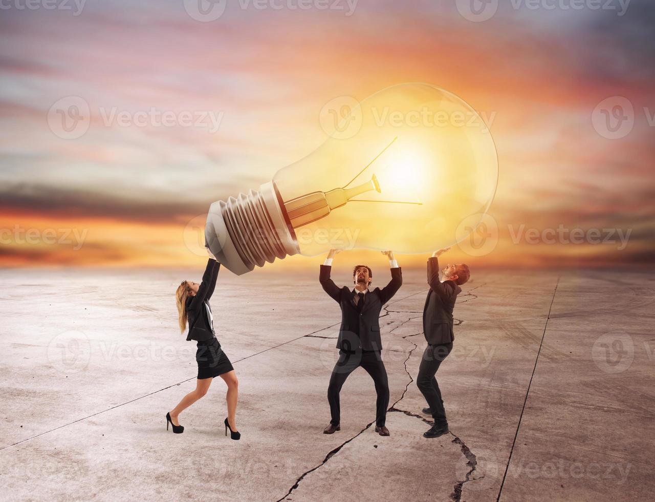 Business people hold a light bulb. concept of new idea and company startup photo