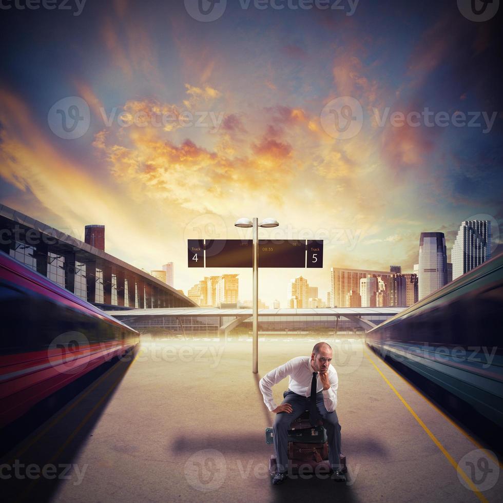 Businessman waiting train photo
