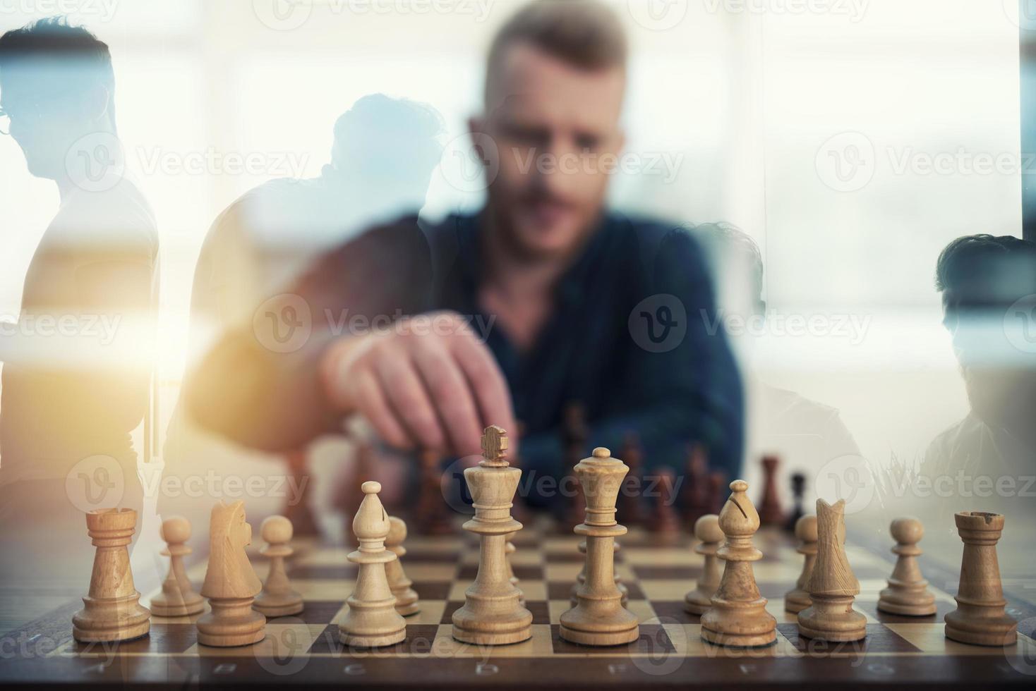 Businessman play with chess game. concept of business strategy and tactic. Double exposure photo