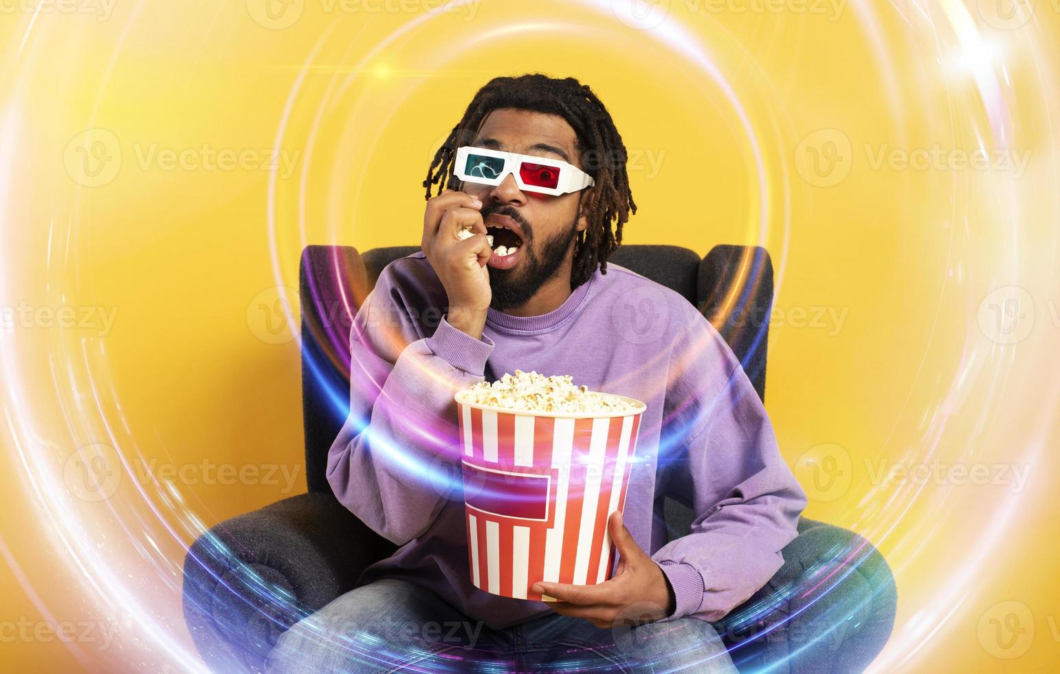 Boy has fun watching a film. concept of entertainment and streaming tv photo