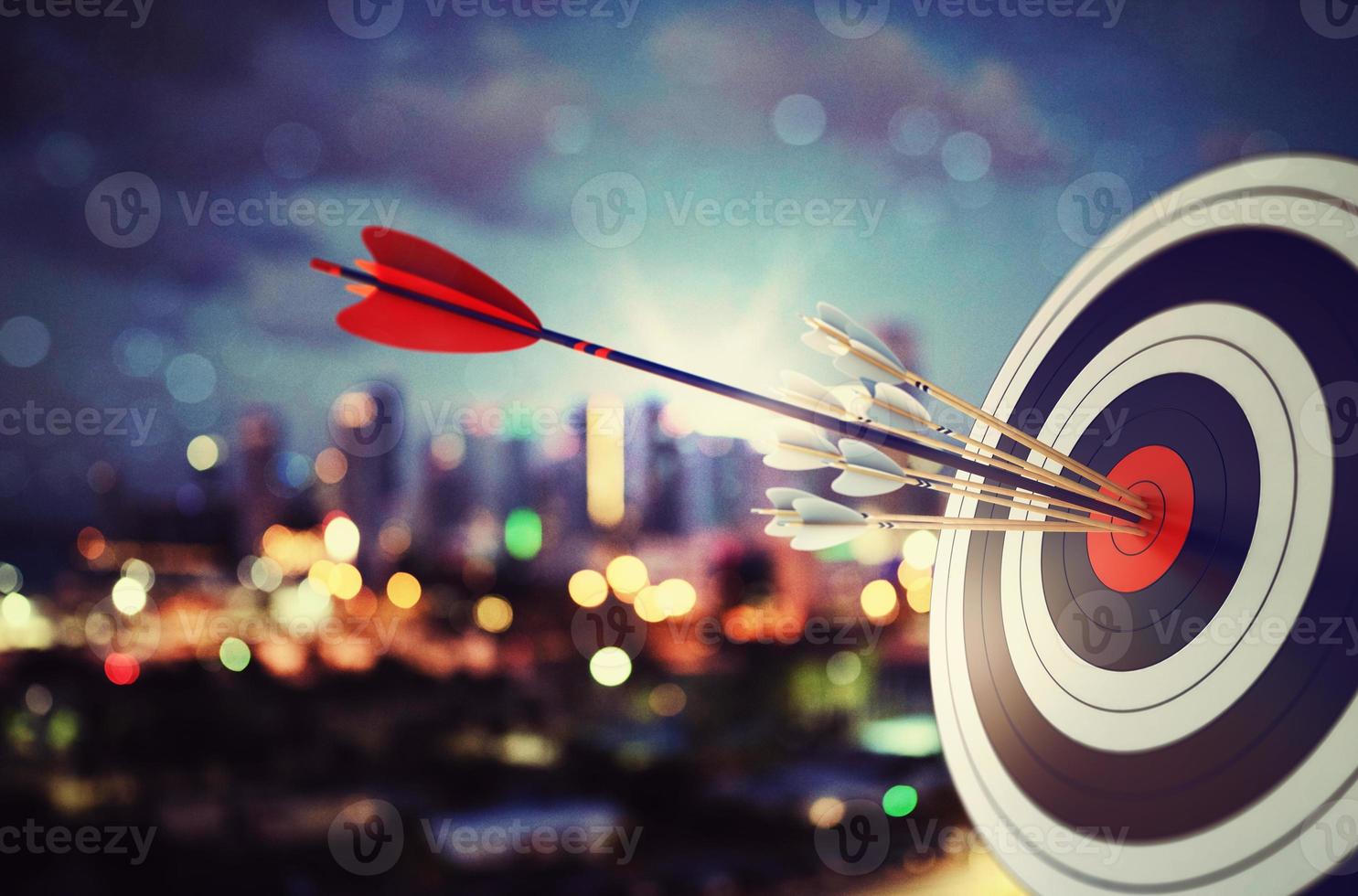 Arrow hit the center of target with modern skyline background. Business target achievement concept. 3D Rendering photo