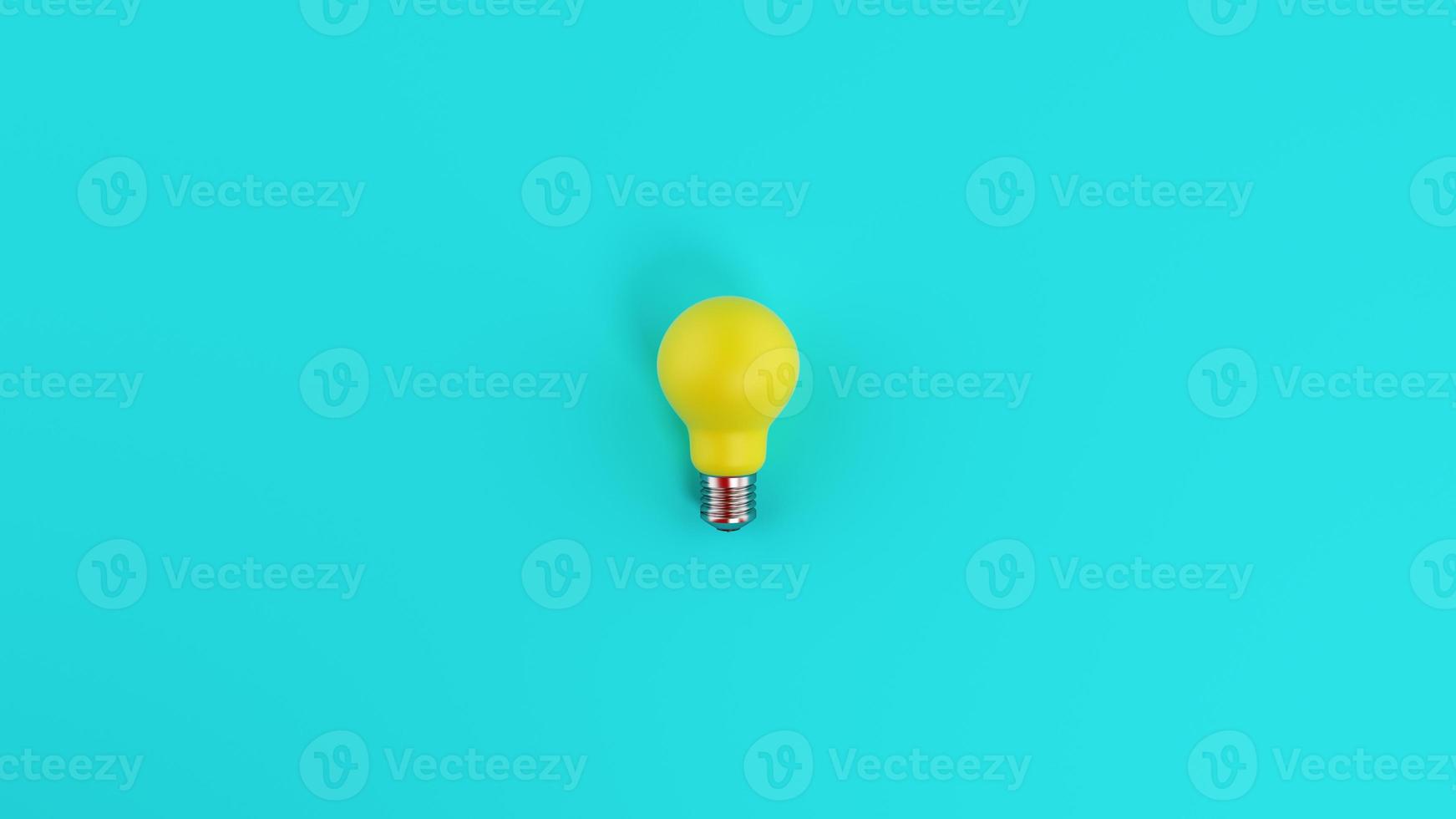 Yellow lightbulb on cyan background. Concept of creativity and idea photo