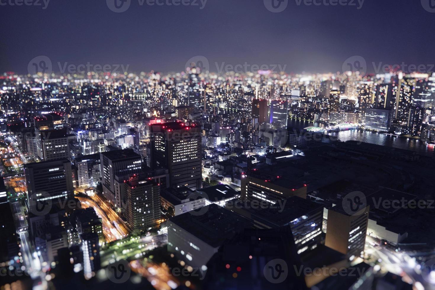 Night skyline of Tokyo city from a skyscraper. photo