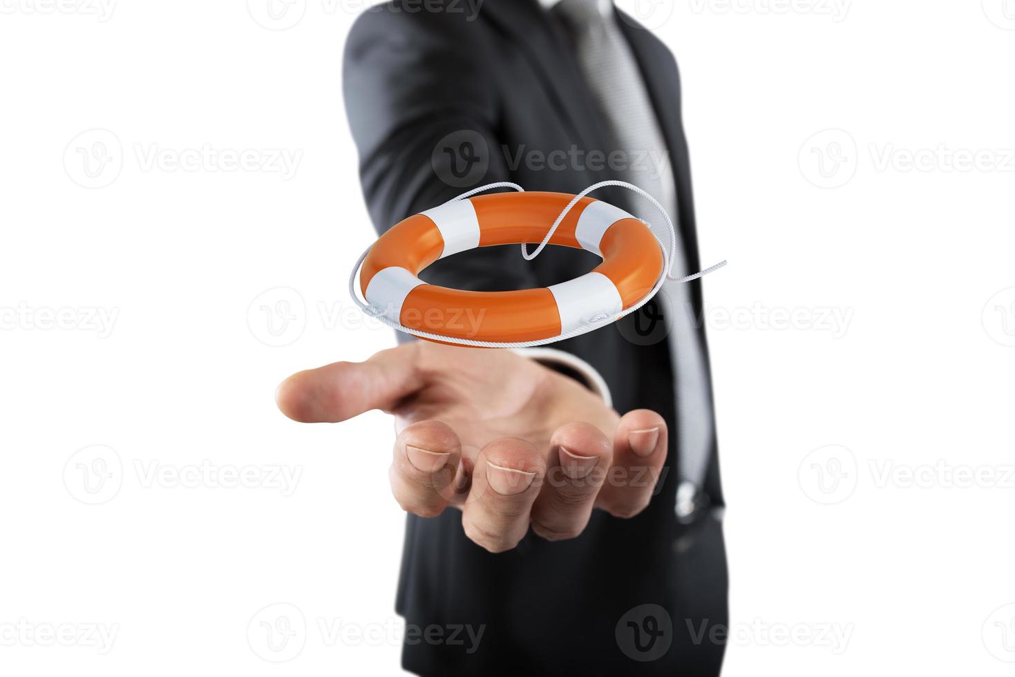 Businessman that hold a lifebelt. Concept of insurance and help in your business photo