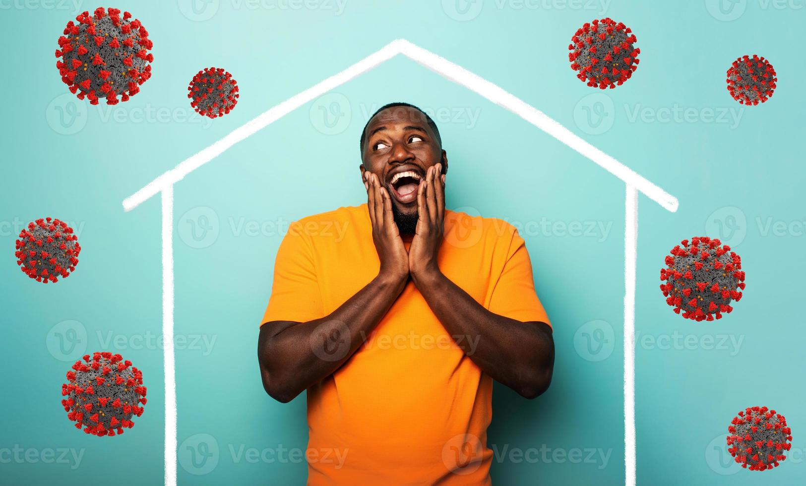 Concept of stay at home message with a man inside his house and around outside covid 19 coronavirus photo