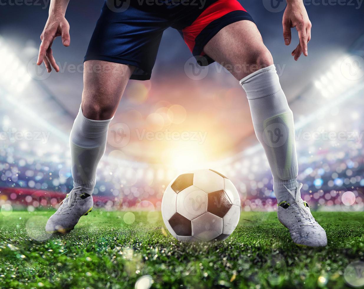 Soccer player ready to kick the soccerball at the stadium during the match. photo