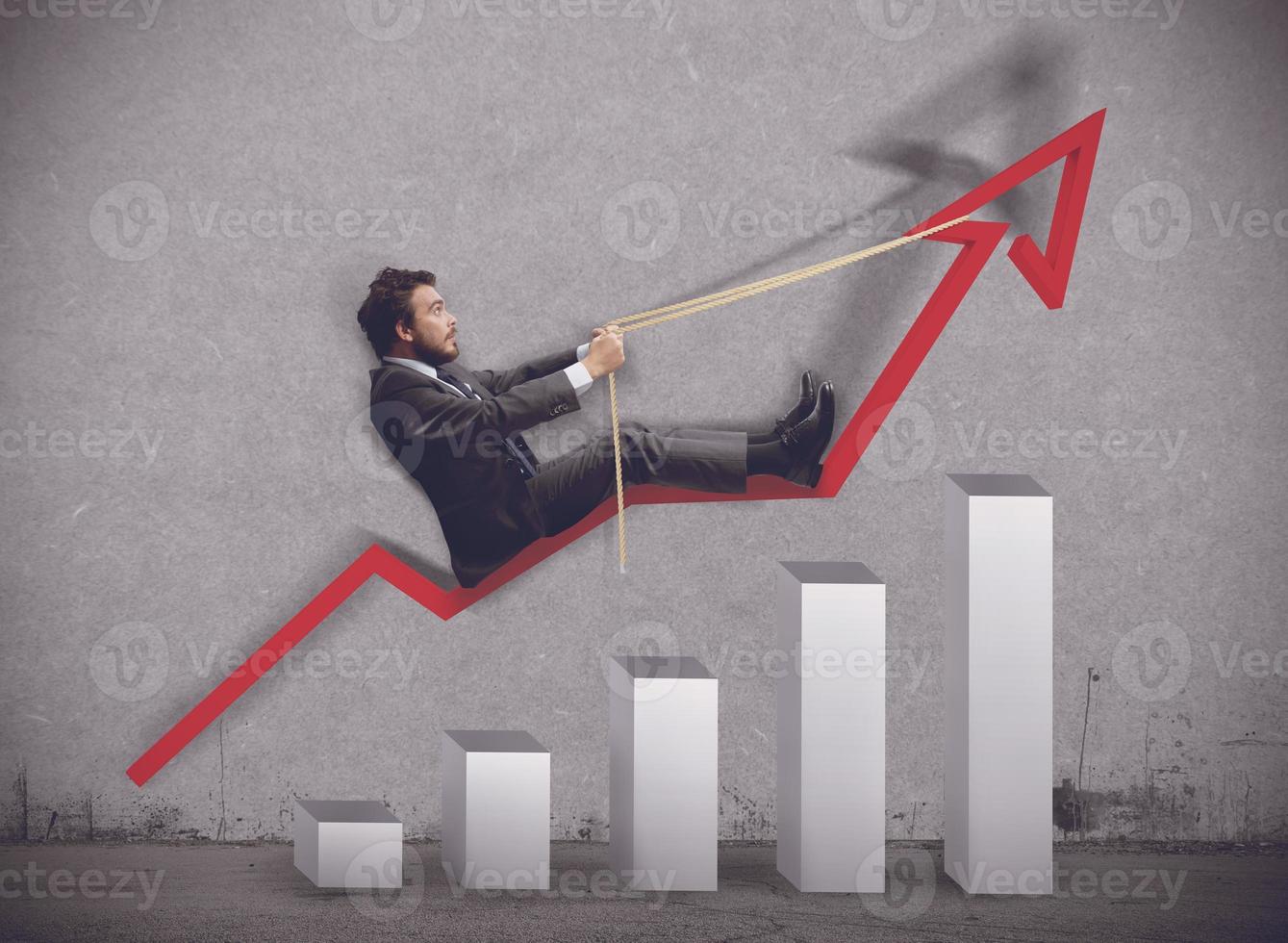 Businessman rides to the rise of economy photo