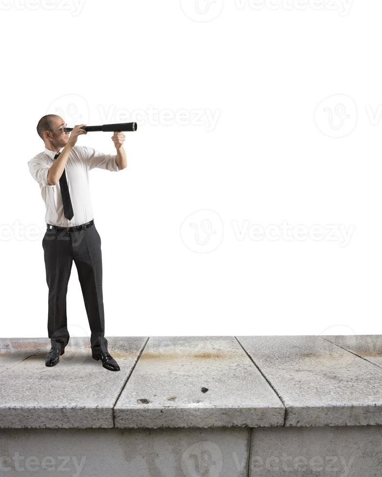 Businessman looks for new business photo