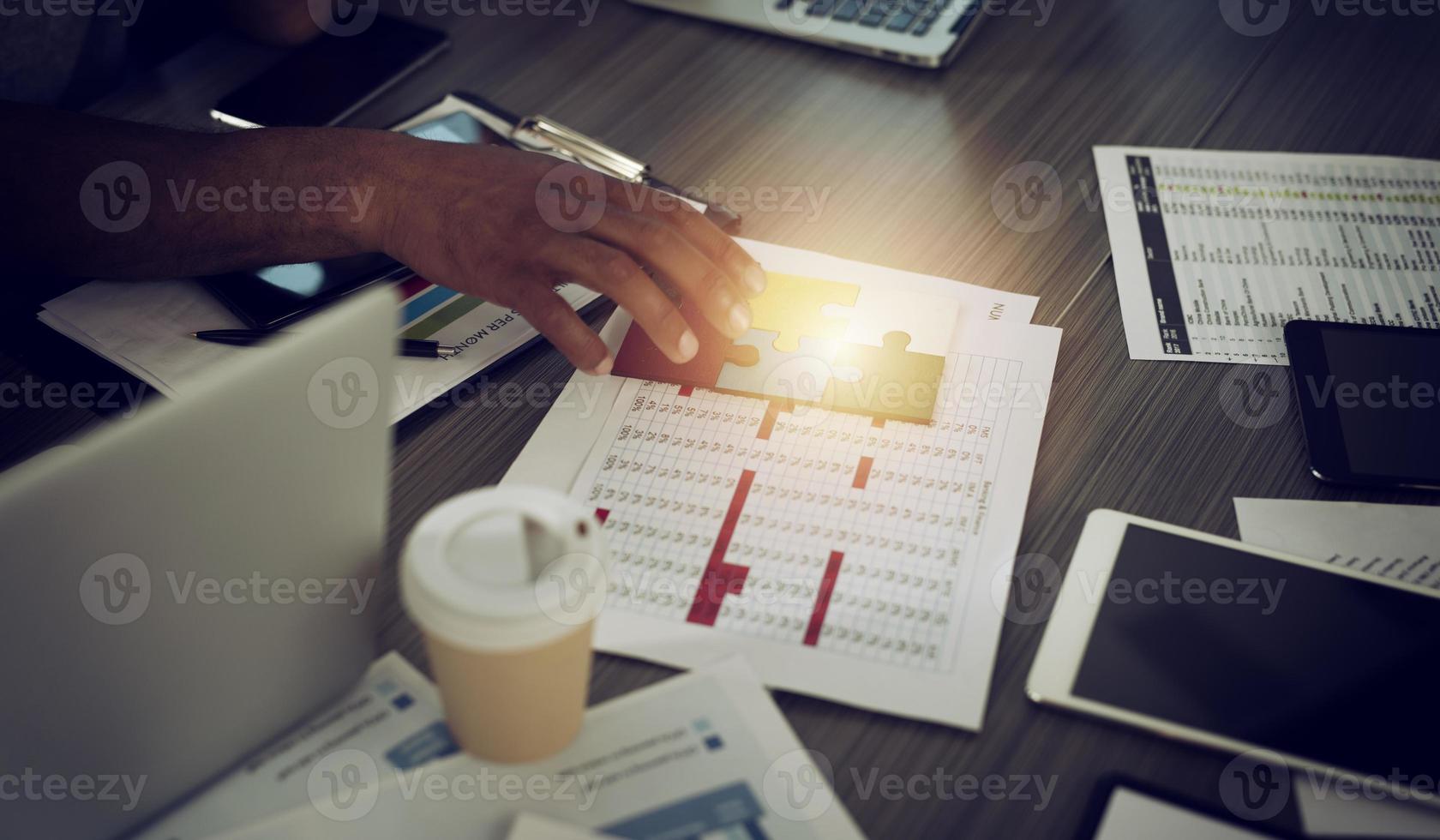 Teamwork of partners. Concept of integration and startup with puzzle pieces photo