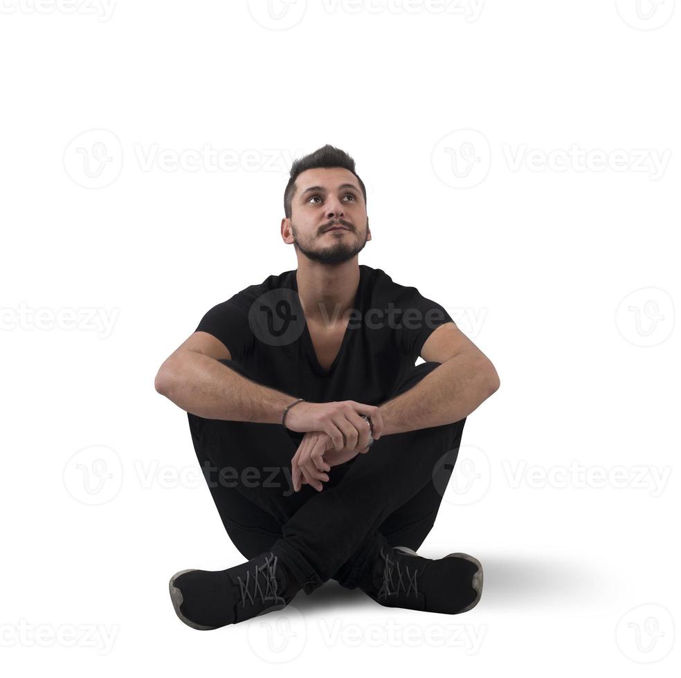 Guy sitting think photo