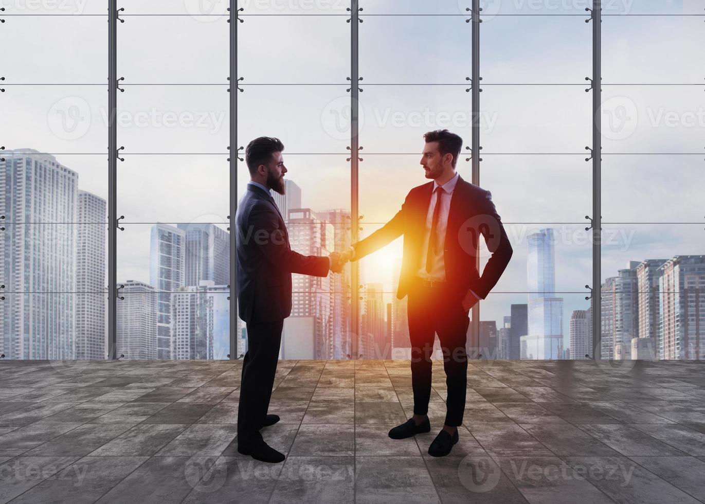 Business handshake. Concept of teamwork and partnership photo