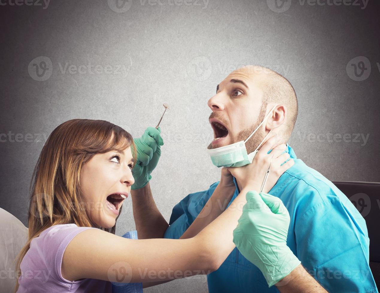 Angry patient by dentist photo