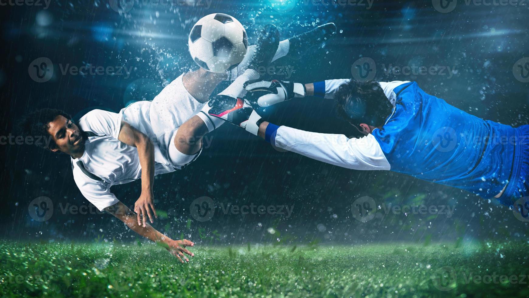 Soccer striker hits the ball with an acrobatic kick in the air at the stadium at night match photo