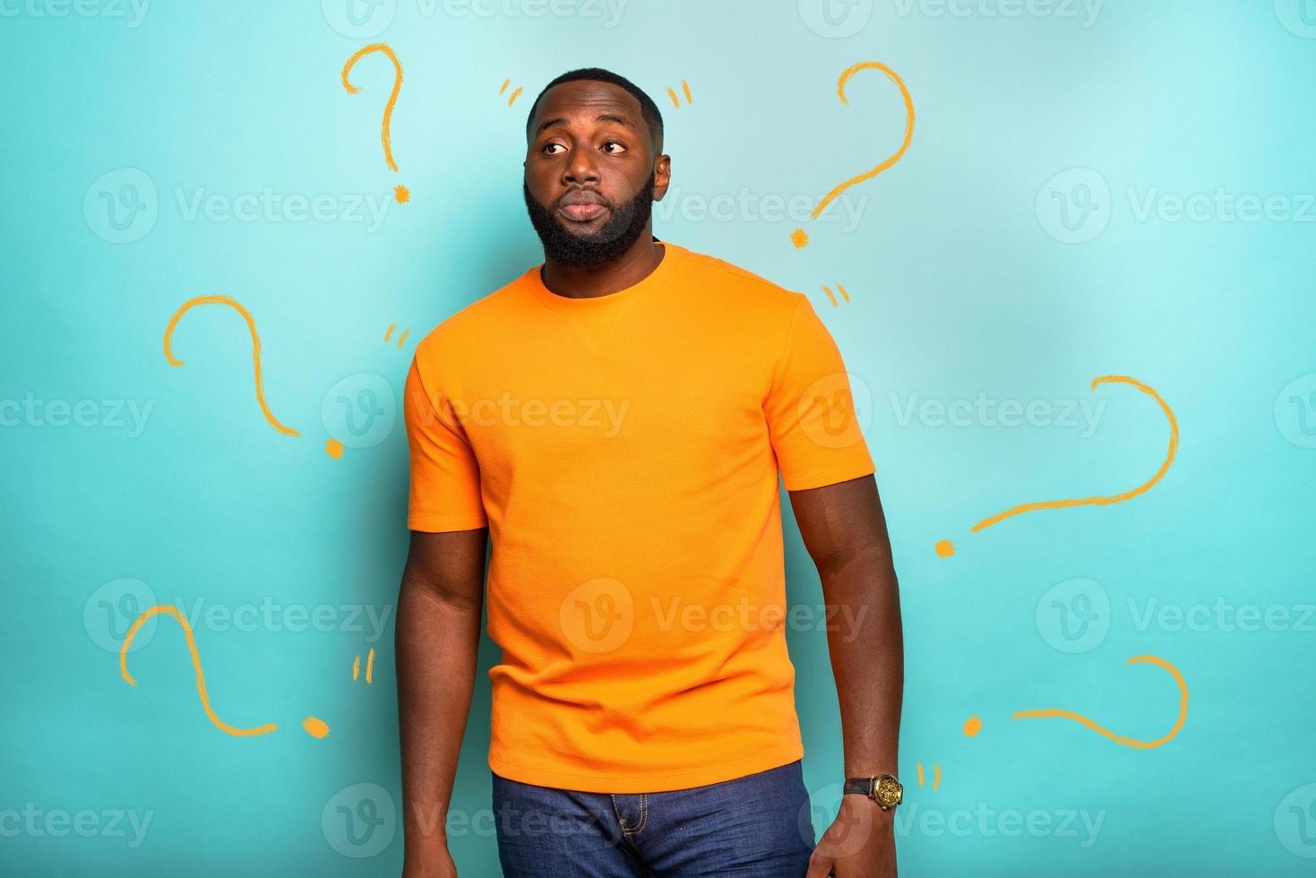 confused man with curious and doubtful expression photo