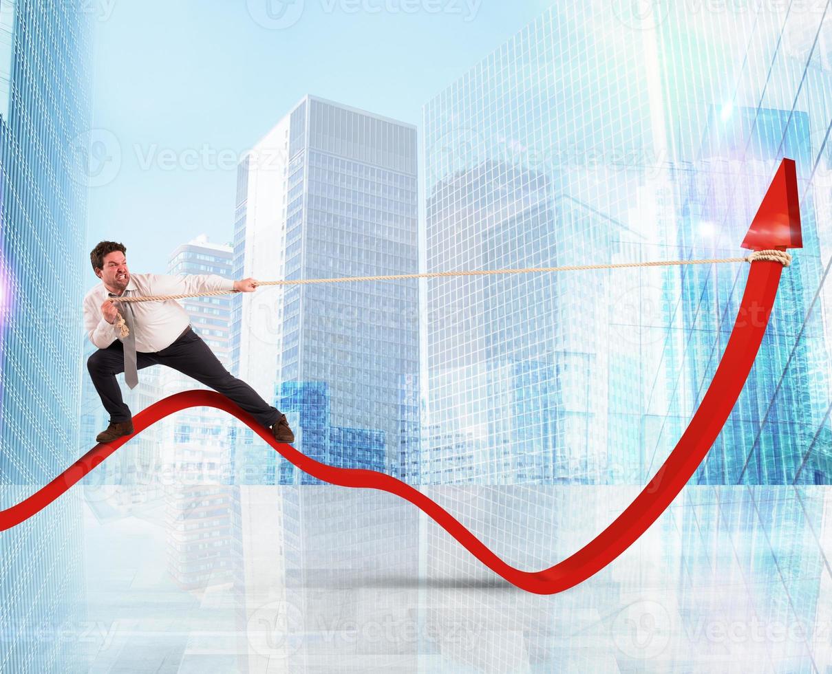 Businessman lifts statistics photo