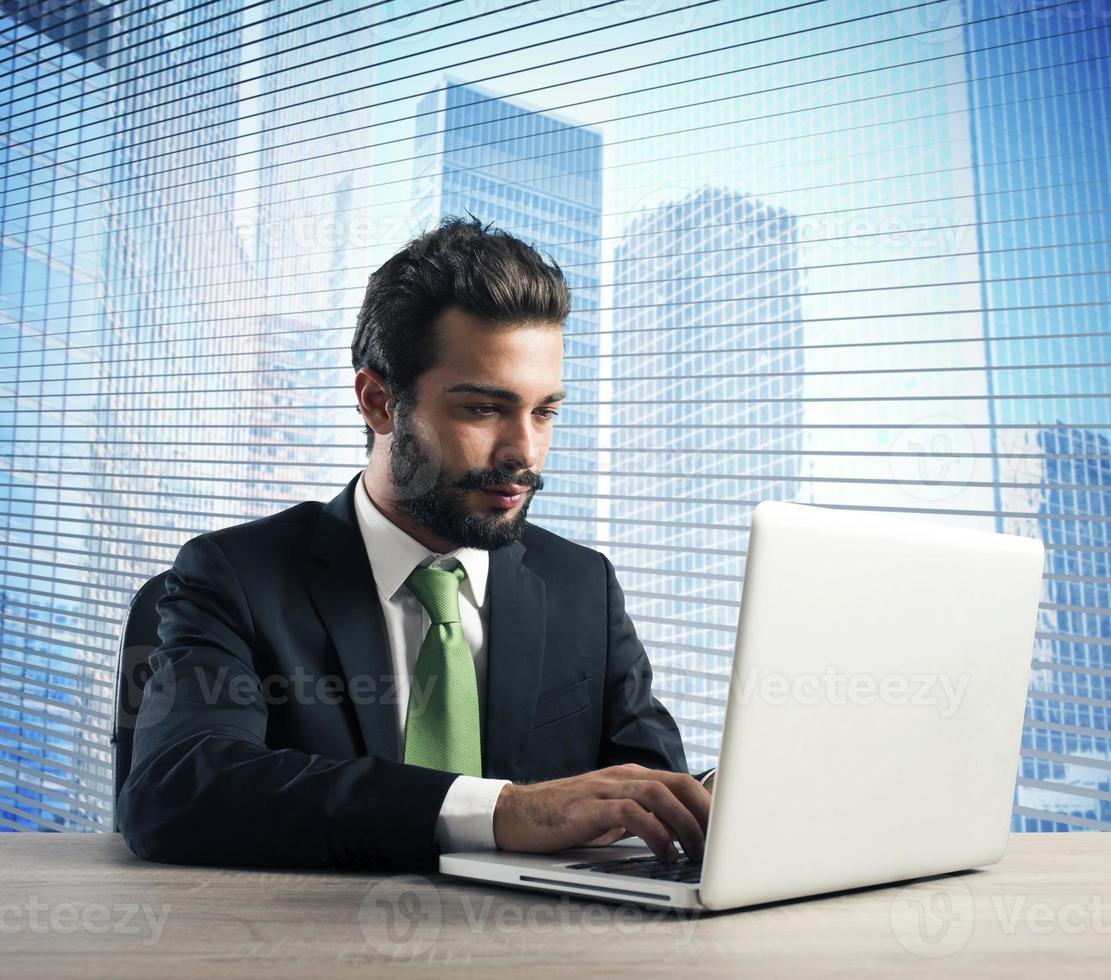 Businessman work with laptop photo