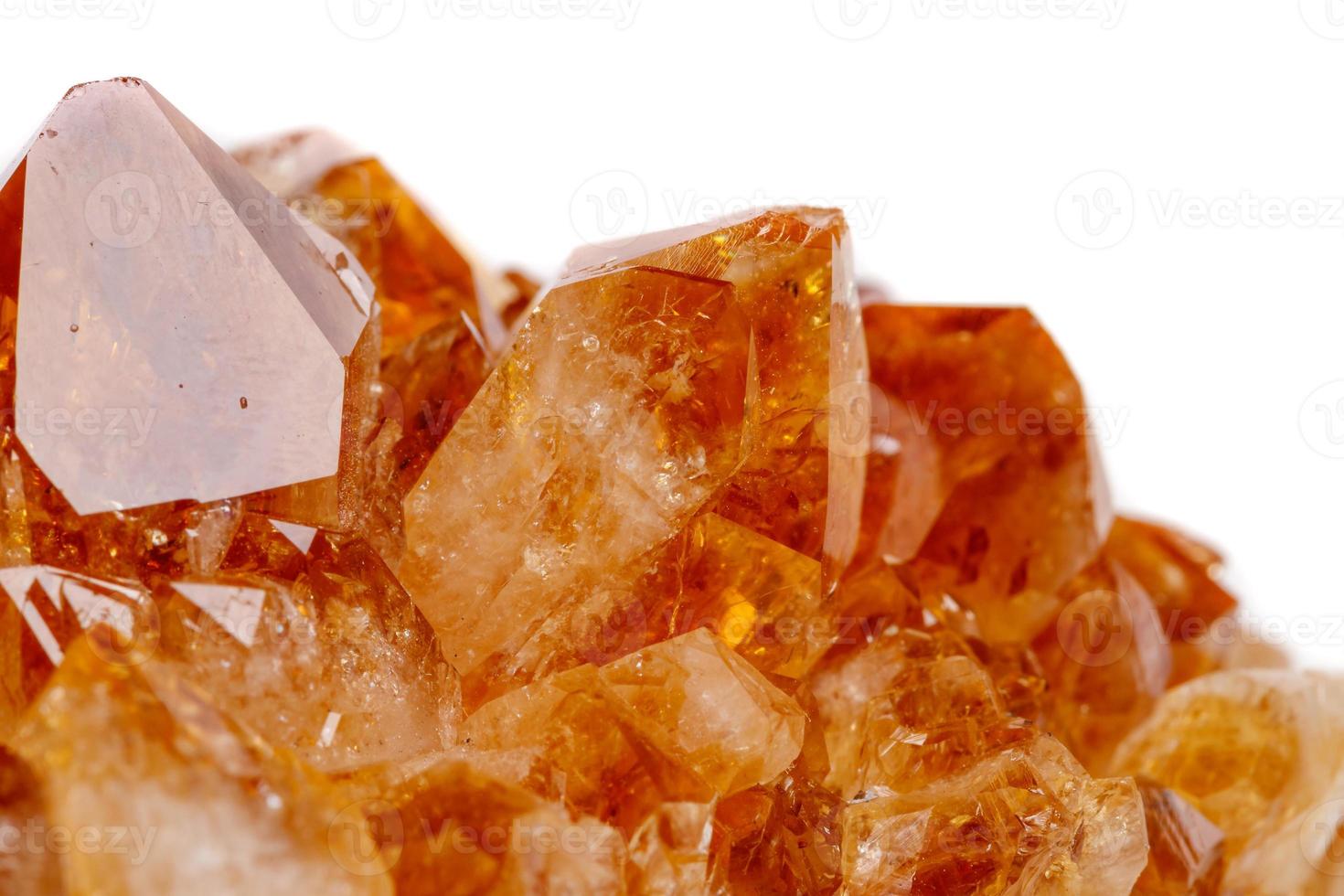 Macro mineral stone Citrine in rock in crystals on a white background photo