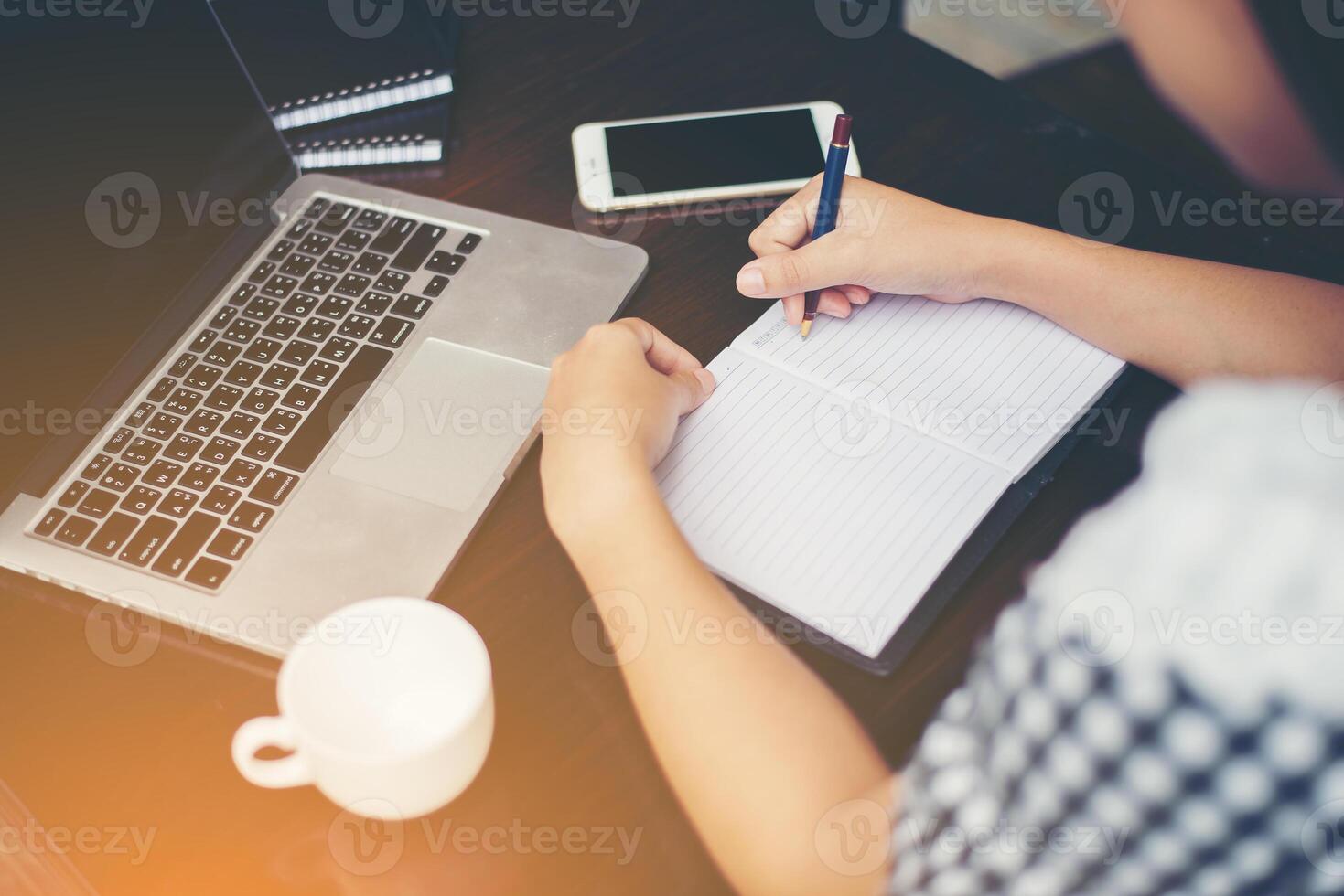 Woman sitting in a coffee shop photo