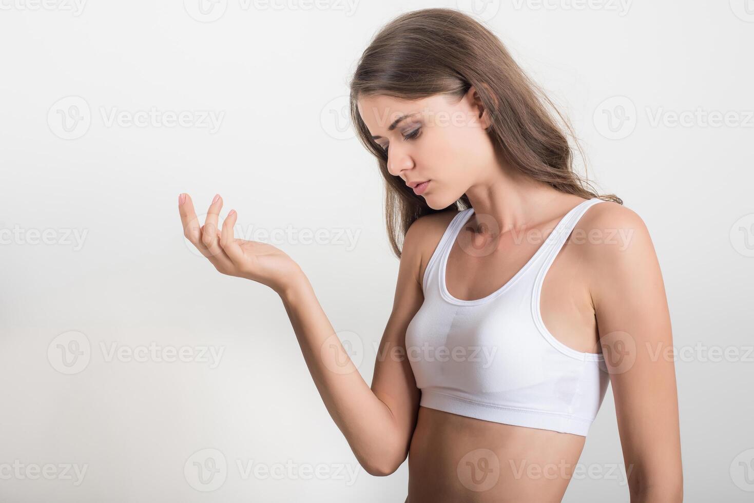 Beautiful woman with healthy body on white background photo