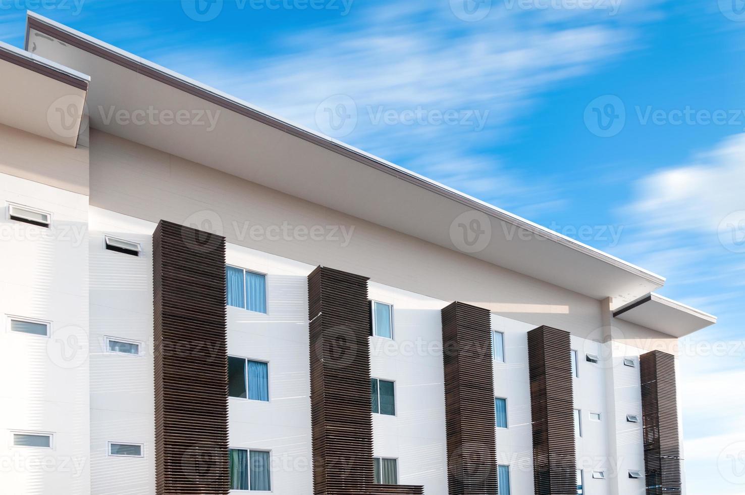 New apartment building over blue sky,Low Angle Architectural Exterior View of Modern photo