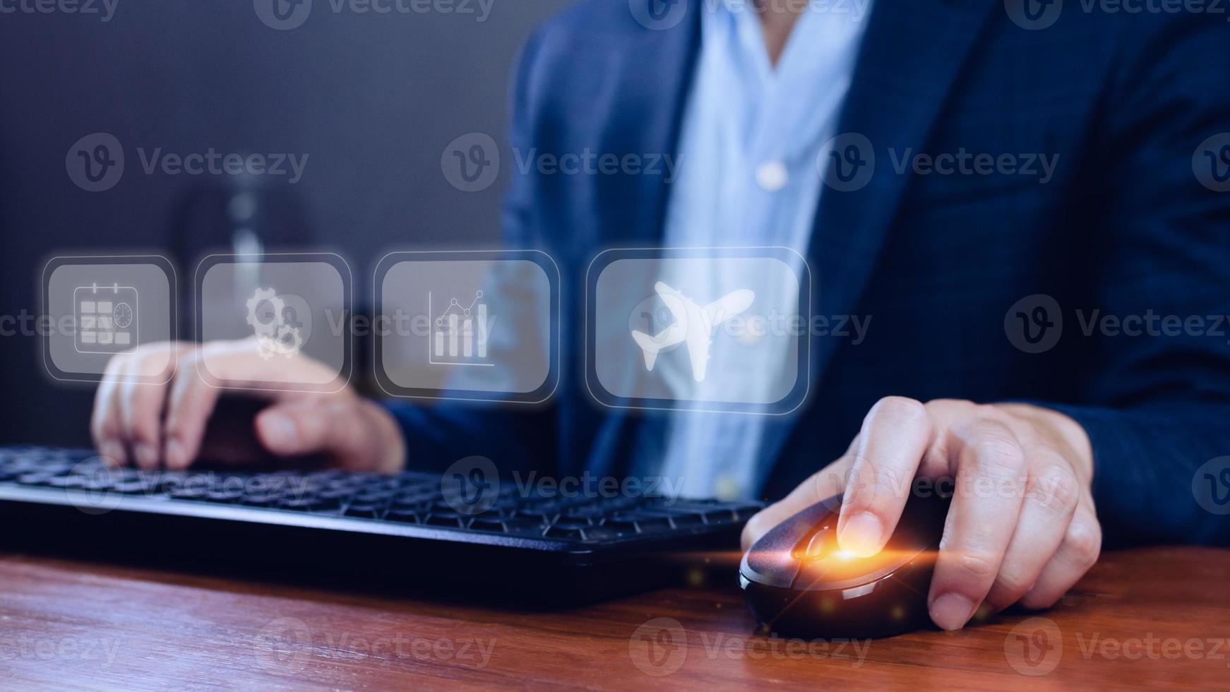 Businessman pointing finger touching to select flight by pressing touch screen airplane button,Business Airplane transportation concept photo