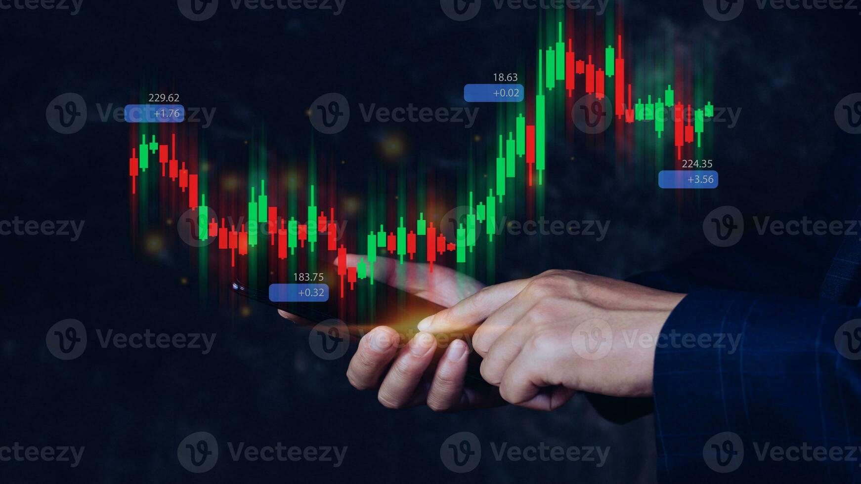 Hand of businessman or trader is showing growing virtual hologram stock on smartphone, planning and strategy, Stock market, Business growth, progress or success concept. invest in trading. photo
