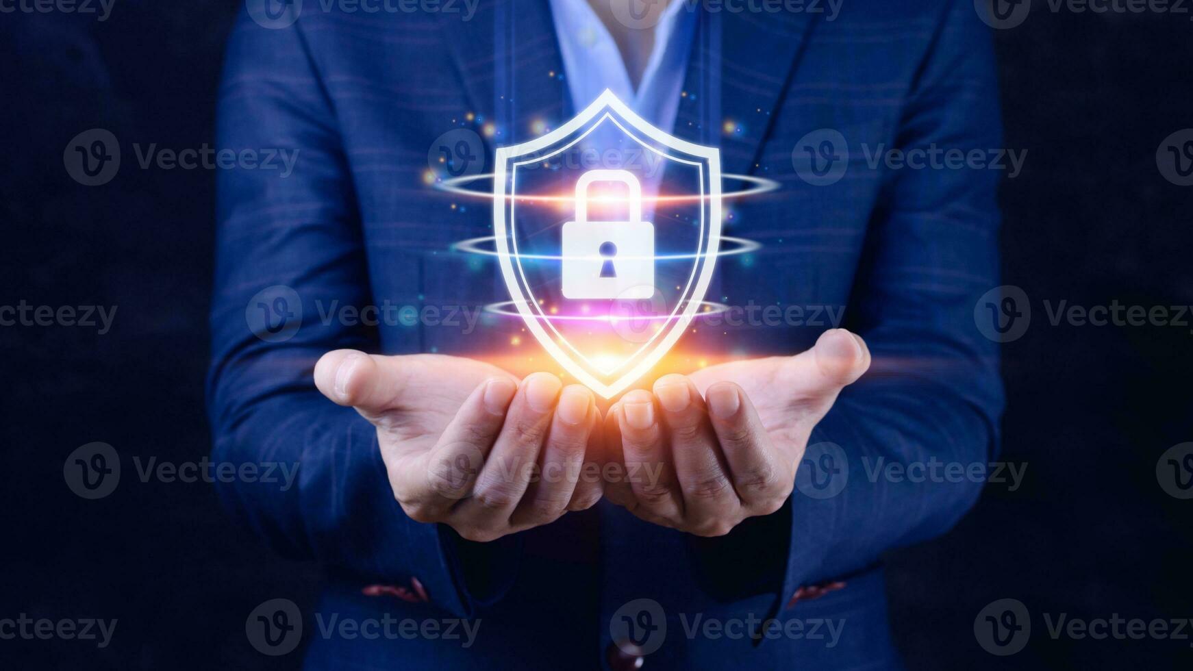 Computer network protection, secure and safe your data concept, businessman holding shield protection icon, Security shield Lock Security Businessman Protect Concept photo