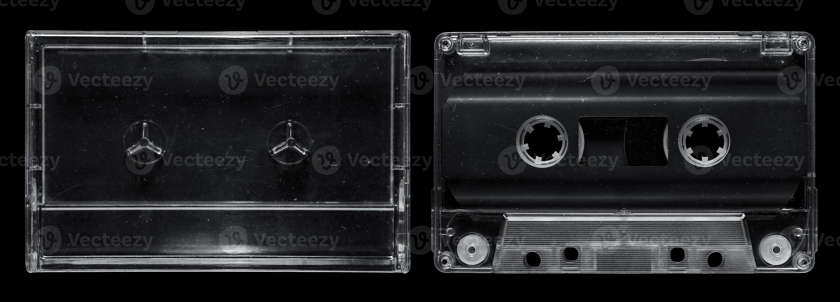 transparent cassette tape and cassette case set on isolated black background photo