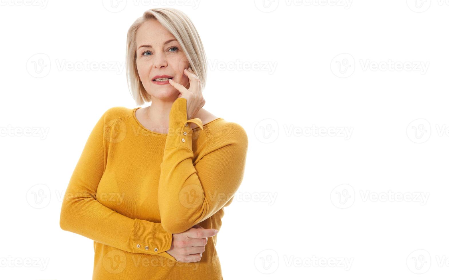 Woman in bright clothes with a finger near her lips isolated on white background. Fashion and beauty concept. Copy space for advertising, to insert text or slogan. Discount, sale, season sales photo