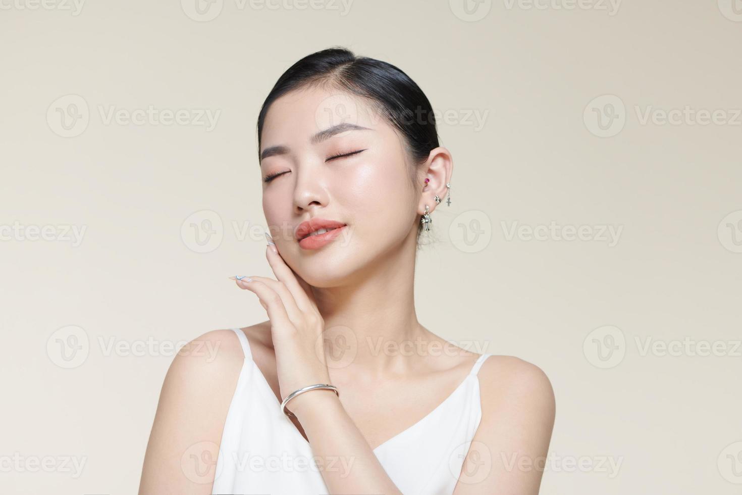 Beautiful happy girl model with fresh dehydrated facial skin and natural makeup photo