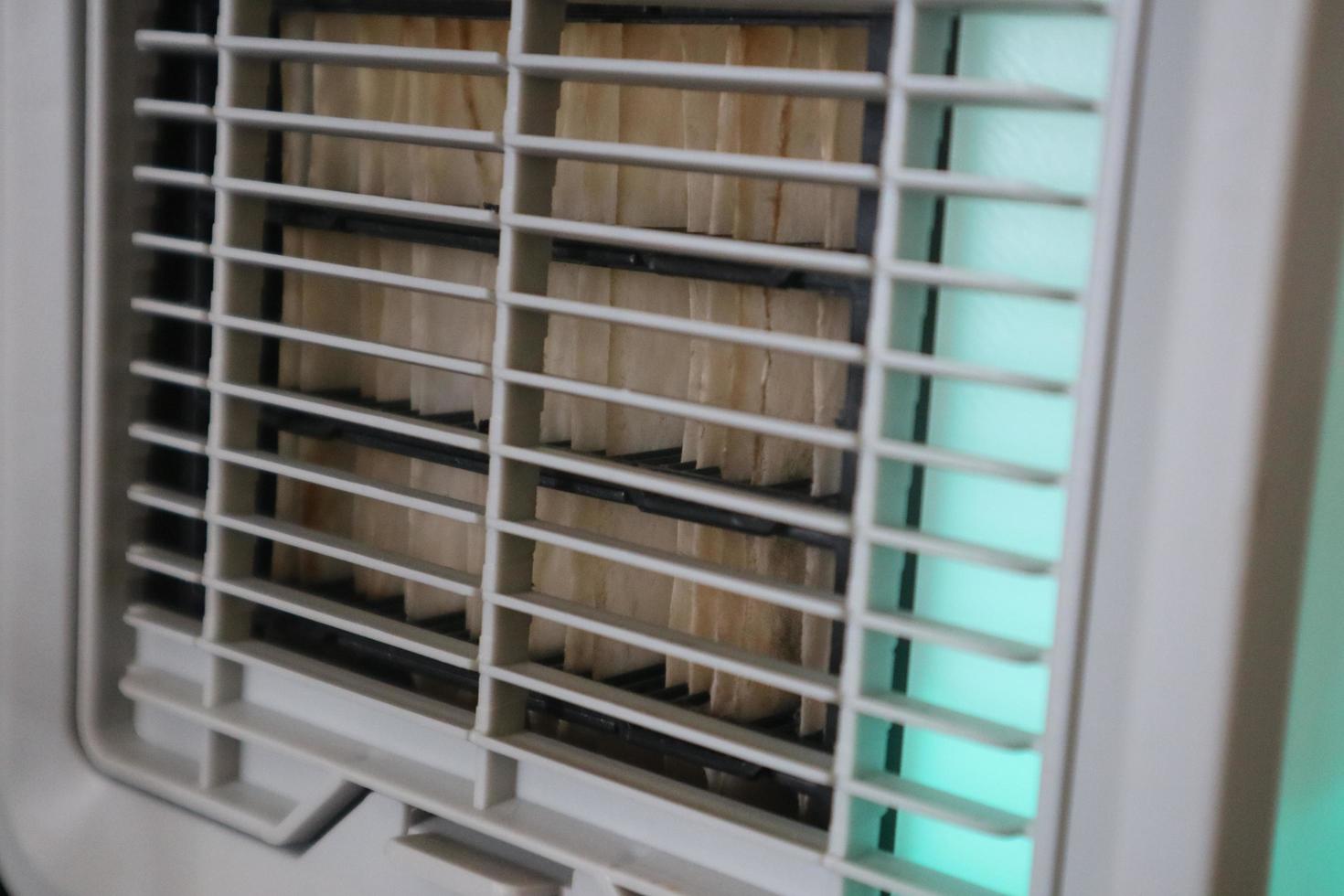 the grille on the mini portable AC is white photo