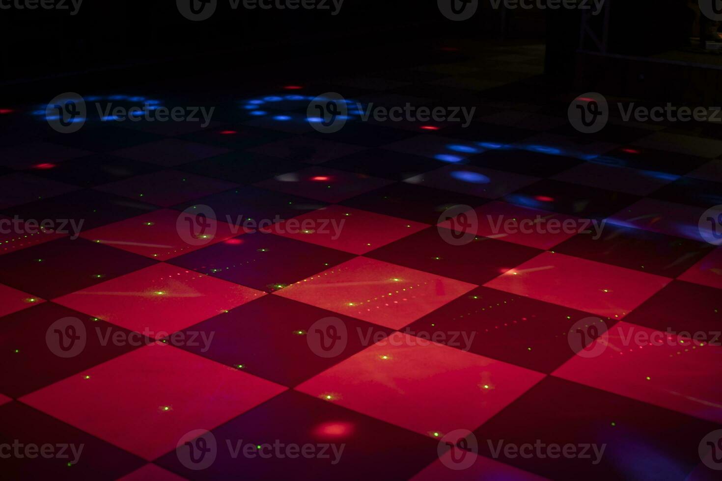 Floor in cage. Floor for dancing. Color music in hall. Bar interior. photo