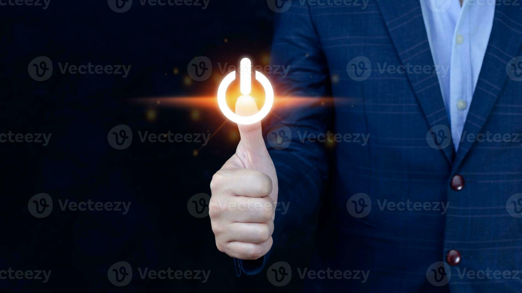 Businessman pushing visual touch screen power button with his finger,network structure,Hand pressing power button photo