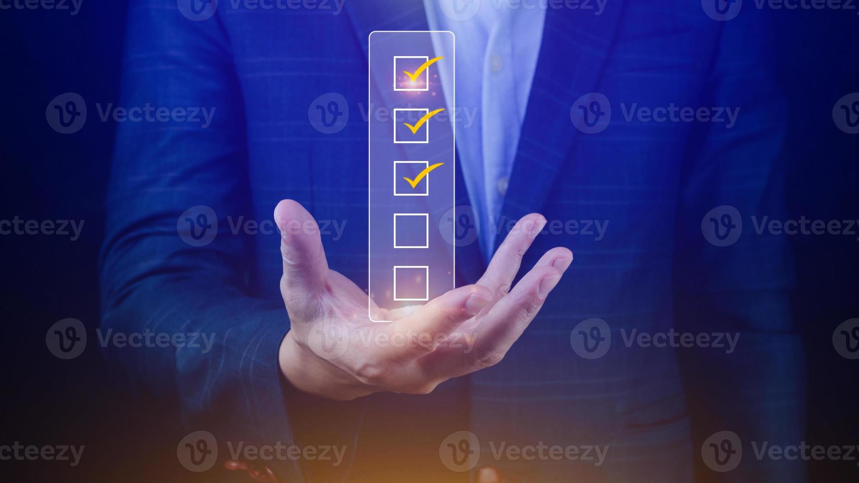 Businessman tick correct sign mark for document approve , project acceptance and quality assurance concept, take an assessment, questionnaire, evaluation, online survey online exam check list photo