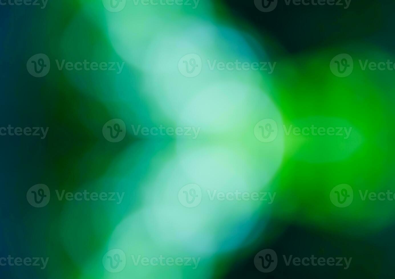 Blurred light  bokeh abstract green background photo