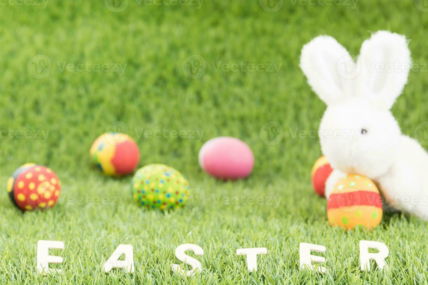 Bunny toys and Easter eggs with text photo