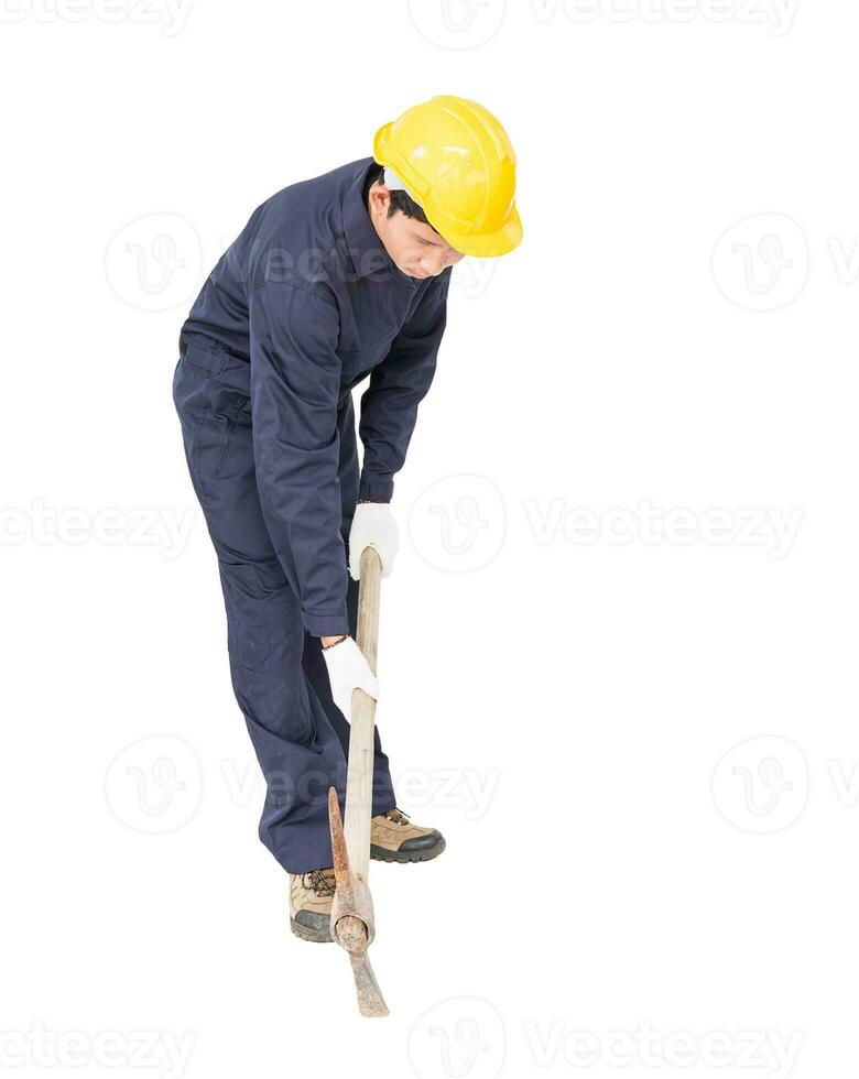 Man in uniform hold old pick mattock that is a mining device photo