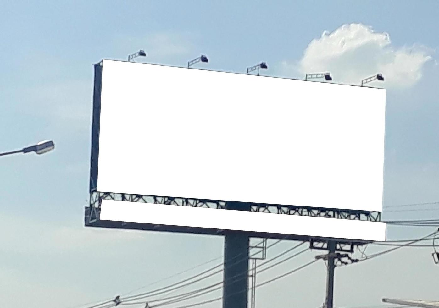 billboard blank for outdoor advertising poster at blue sky. photo