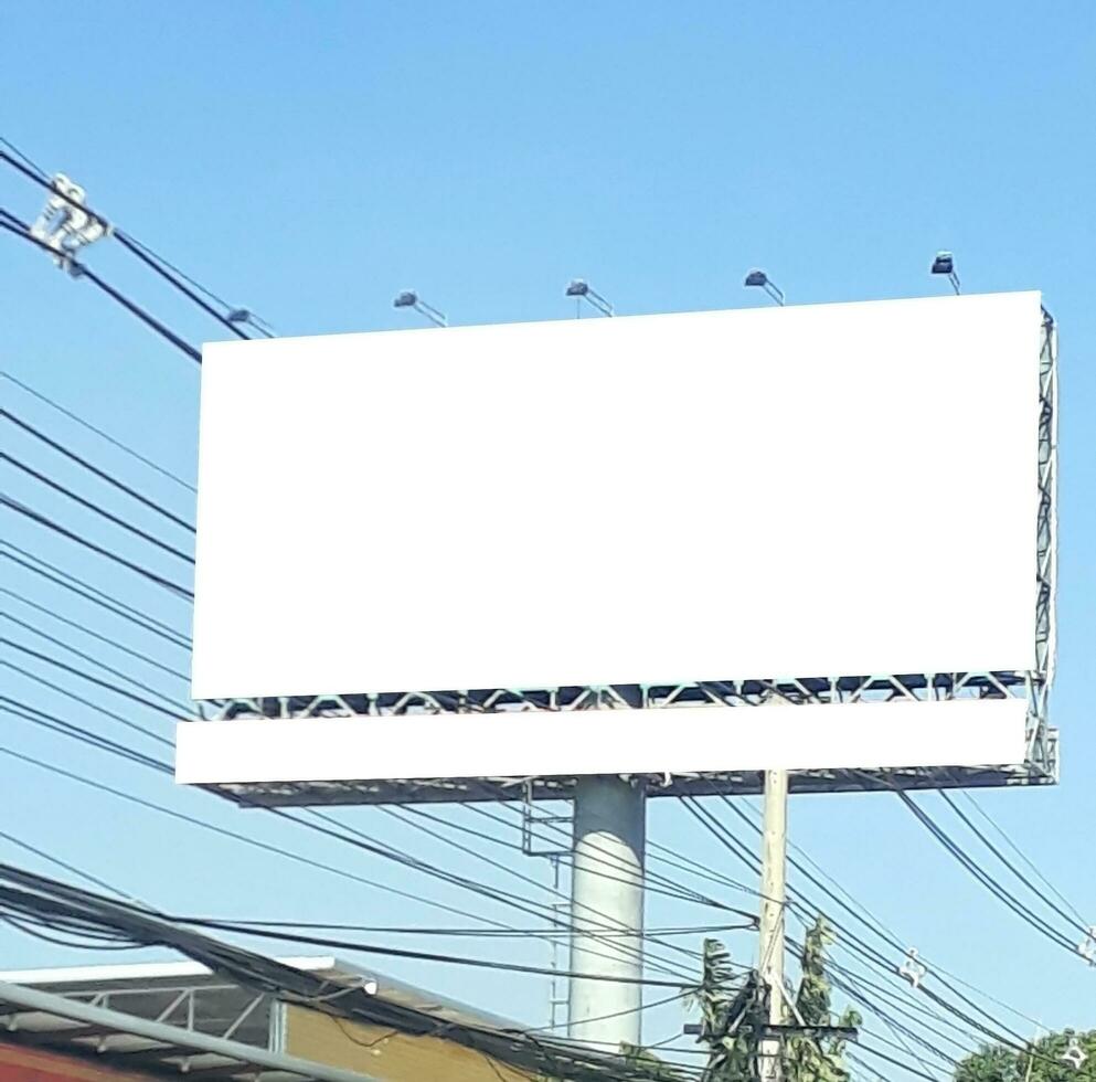 billboard blank for outdoor advertising poster at blue sky. photo