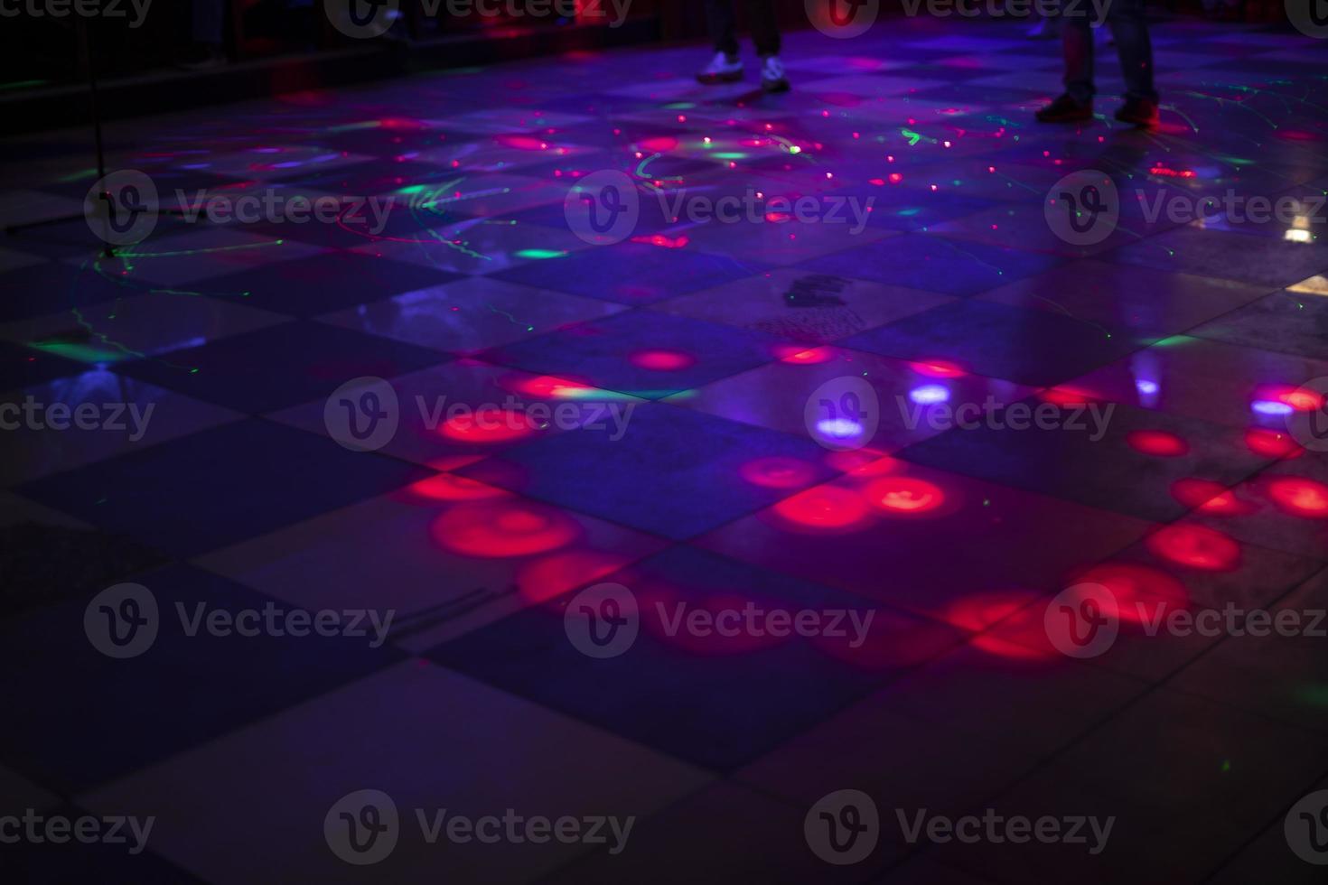 Music and color. Dance floor. Disco and floor lighting. photo