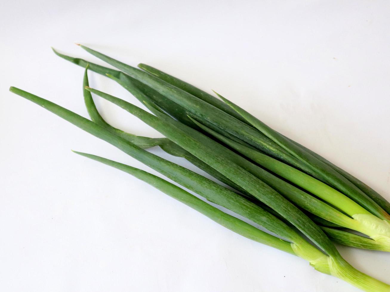 Fresh chives on a white background for easy cropping photo