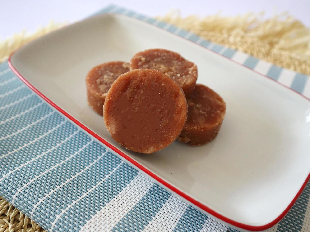 Organic brown palm sugar or coconut sugar, better known as Java sugar. photo